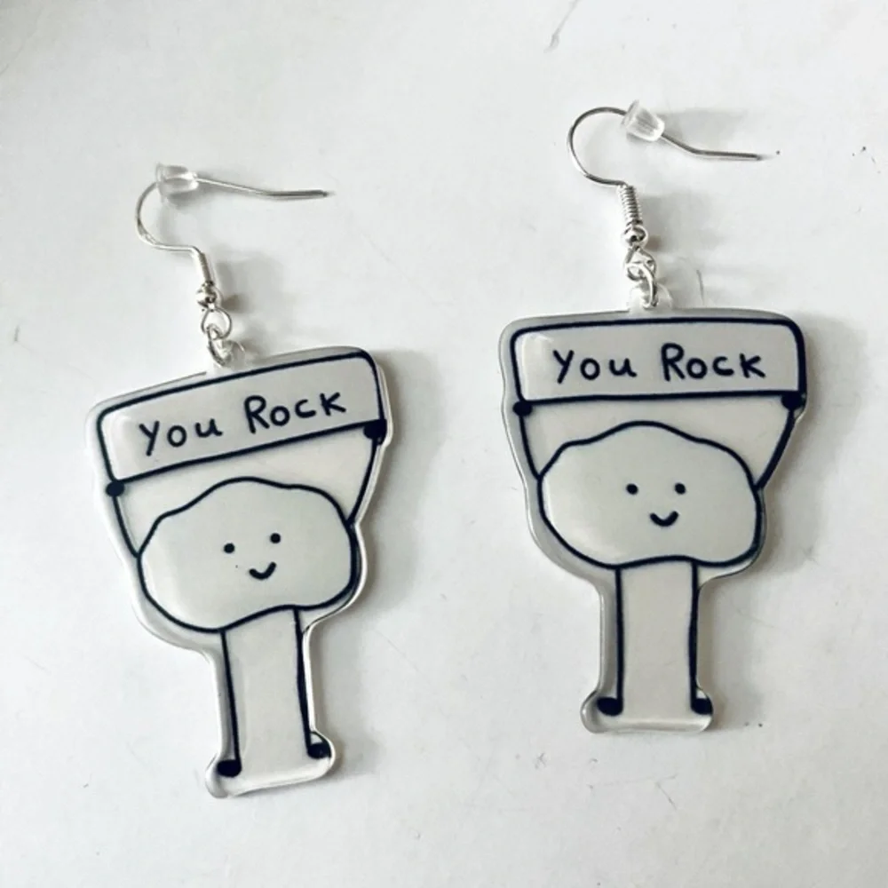 NWT - Positive earrings rock holding a “You Rock” sign - acrylic dangling